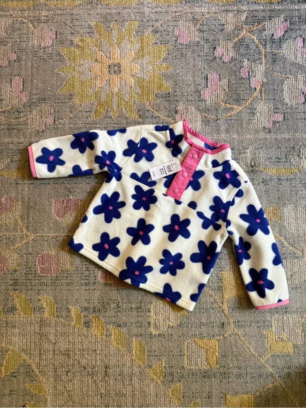 Girls White Fleece Pullover Jacket with Blue Flower Print and Pink Trim